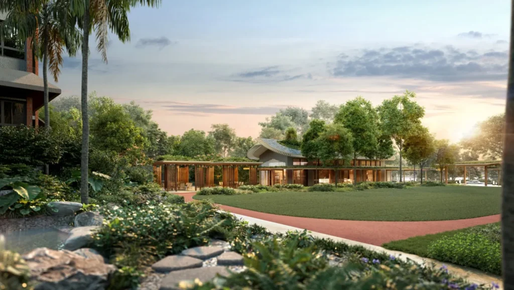 Springleaf Residence's expansive central garden lawn with lush green landscaping, pathways, and outdoor seating, providing serene recreational space.