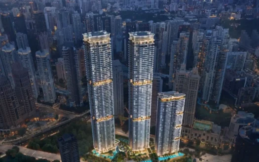 An aerial view of Zyon Grand's iconic towers against the twilight Singapore skyline, highlighting the commanding height and proximity to the CBD and surrounding urban landscape.